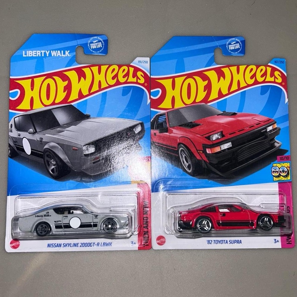 Hot Wheels Nissan Skyine 2000GT-R LBWK & '82 Toyota Supra 2 Diecast Car Bundle